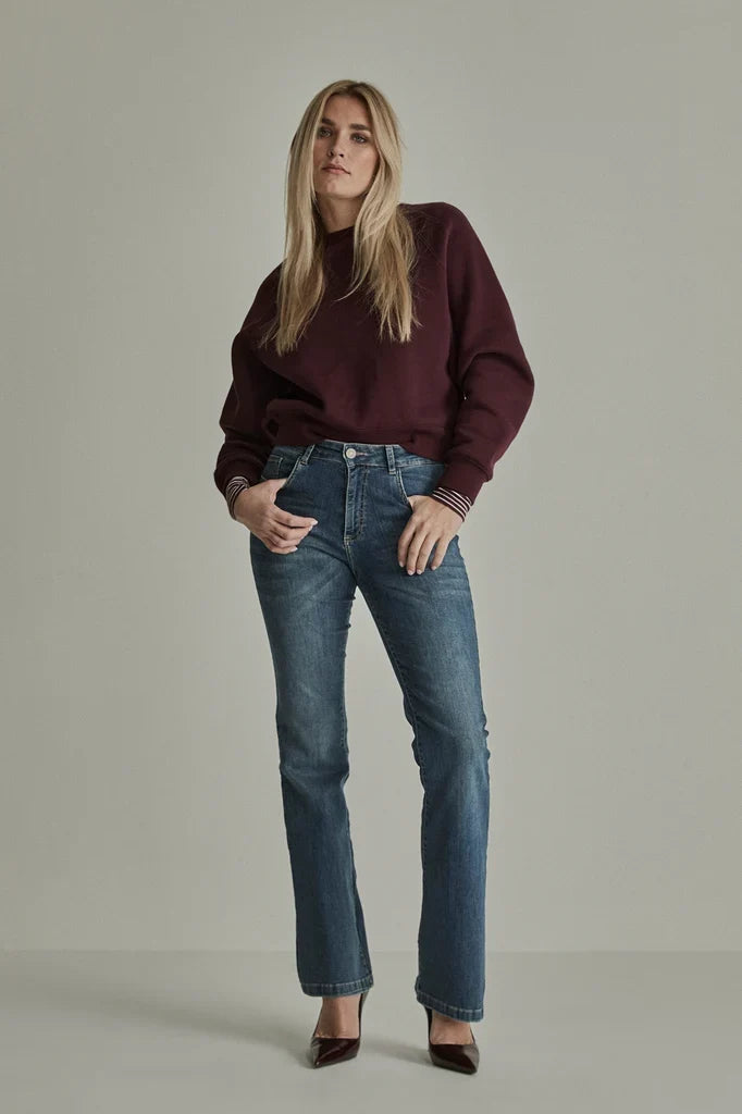 Caridad | Vaquero bootcut azul claro desgastado
