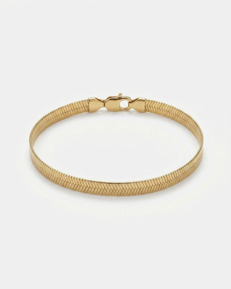 Sloane | Brazalete rígido dorado de espiga
